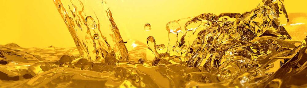 Golden oil being poured