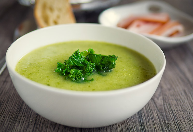 A bowl of green soup
