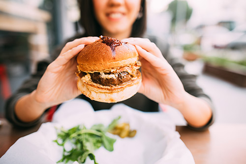 Enjoying a plant-based burger