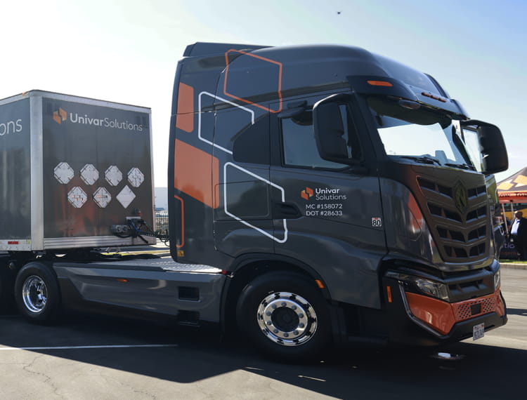 A large Univar branded etruck parked outside.